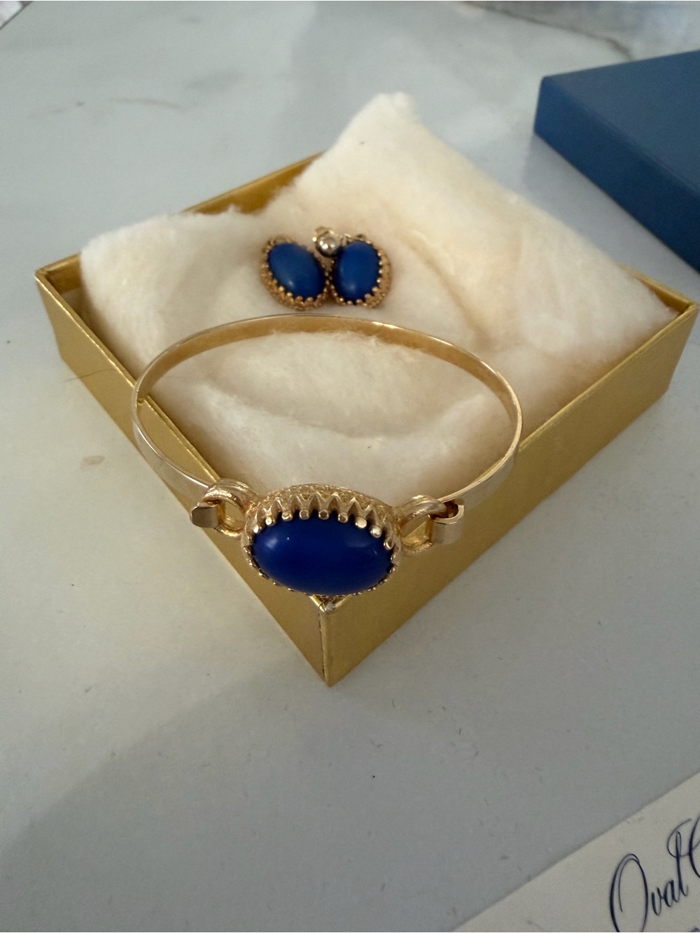 Vintage 1970 Avon Gold-Tone Bracelet and Earrings with Blue Cabochons